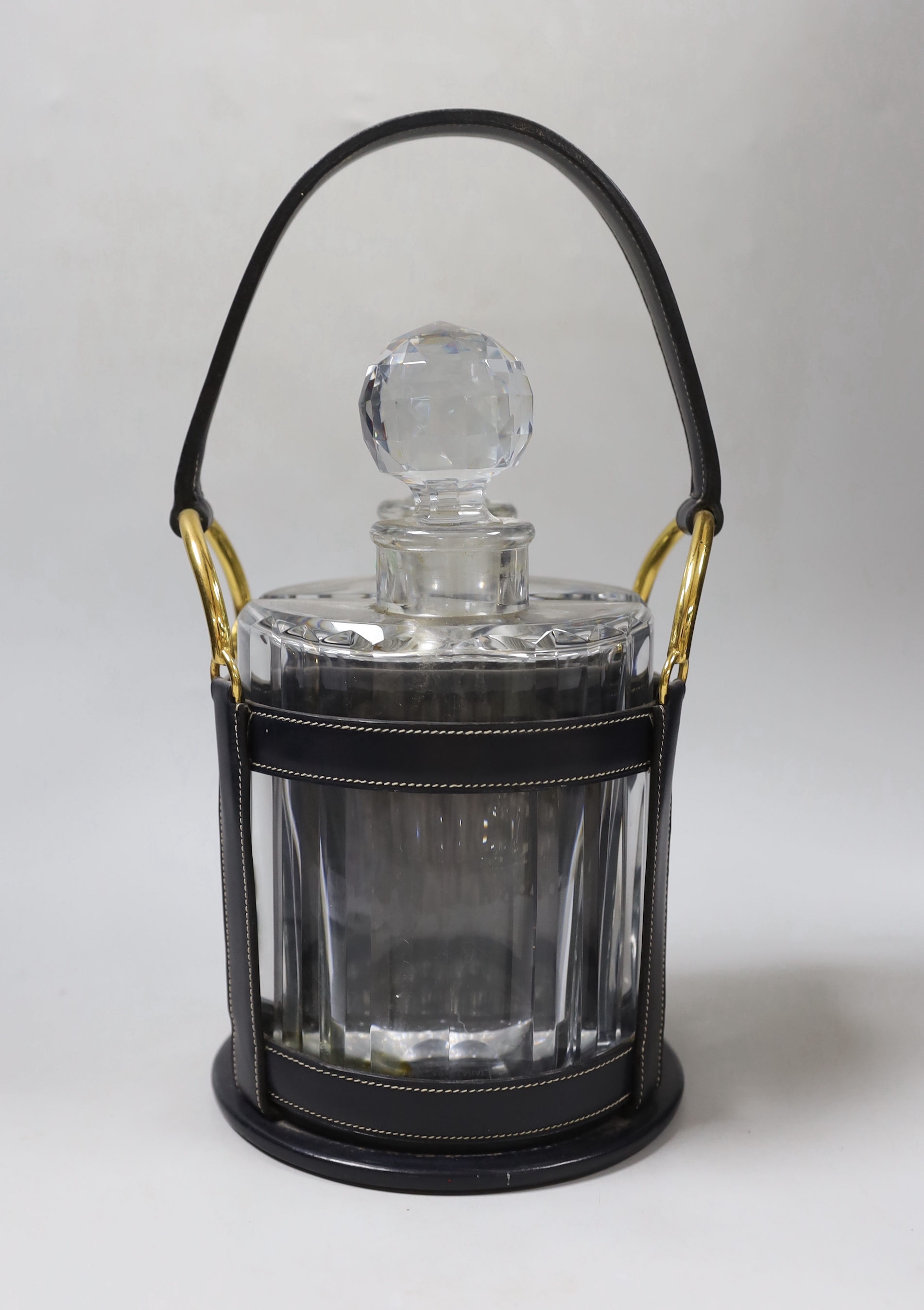 An Hermes black leather decanter set, fitted with two Baccarat glass decanters